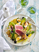 Nicoise salad with tuna, eggs, beans and olives