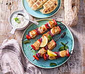 Chicken and vegetable skewers with tzatziki