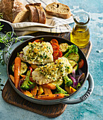 Cod with herb crust and roasted vegetables