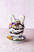 Easter trifle with edible flowers and meringue ears