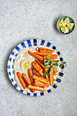 Roasted carrot sticks with curry yogurt dressing