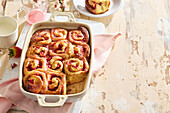 Yeast buns with strawberry filling and icing