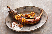 Grilled chocolate banana with walnuts