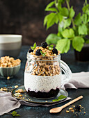 Chia pudding with granola and blackberries