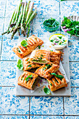 Puff pastry pockets with green asparagus filling