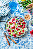 Asparagus carpaccio with raspberries and burrata