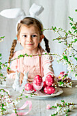 Easter colored eggs with dried flowers