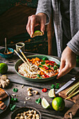 Curry with salmon and rice noodles