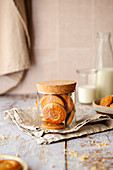 Butter cookies in a glass, milk is poured