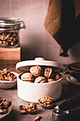 Walnuts in a ceramic tin