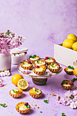 Mini lemon tartlets with raspberry and mint