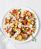 Roasted sweet potato salad with sweetcorn and peppers