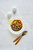 Black rice noodles with prawns and vegetables