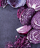 Whole and sliced red cabbage