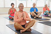 People Practicing Yoga at Yoga Studio