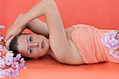 Beauty Portrait of Woman with Cherry Blossom