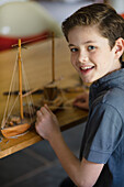 Boy Building Model Ship