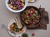 Still life tabletop view healthy Mediterranean meal of spelt salad with radicchio and vegetables