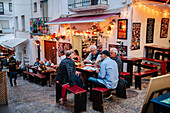 People enjoying the gastronomic offer of the old town in Peñiscola, Castellon, Valencian Community, Spain