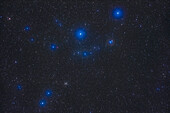 The pair of small open star clusters in northern Orion: NGC 2194 at lower left, a rich cluster, and NGC 2169 at upper right, a loose cluster but with stars arranged in two groups making it look like a number 37 or an XY letter pair. The small red nebula at left above NGC 2194 is Sharpless 2-269.