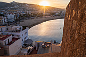 View at sunset from the city walls of the Papa Luna castle in Peñiscola, Castellon, Valencian Community, Spain