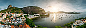 Aerial drone panorama of Urca neighbourhood and surrounding Botafogo and Guanabara Bay, UNESCO World Heritage Site, between the Mountain and the Sea, inscribed on the World Heritage List in 2012, Rio de Janeiro, Brazil, South America