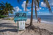 View of rustic massage sign on beach near Puerto Morelos, Caribbean Coast, Yucatan Peninsula, Mexico, North America