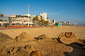 View of promenade, beach and hotels from pier in Indian Ocean, Durban, KwaZulu-Natal Province, South Africa, Africa