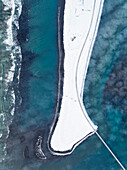 Aerial view by drone of the coastal road near to Selfoss during a cold winter day, Selfoss, Iceland, Polar Regions