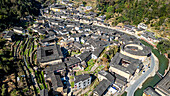 Aerial of Taxia village and Fujian Tulou, rural dwelling of the Hakka, Fujian, China, Asia