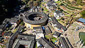 Aerial of Taxia village and Fujian Tulou, rural dwelling of the Hakka, Fujian, China, Asia