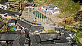 Aerial of Taxia village and Fujian Tulou, rural dwelling of the Hakka, Fujian, China, Asia