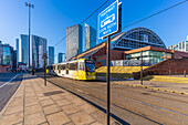 View of apartment buildings, city tram and Manchester Central Convention Complex, Manchester, Lancashire, England, United Kingdom, Europe