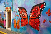 Mural of red butterfly, colourful Street Art, Avenue Hidalgo, Atlixco, Pueblos Magicos, Puebla State, Mexico, North America