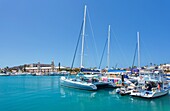 Vessels in the harbour and The Old Storehouse, The Royal Naval Dockyard, Sandys, Bermuda, North Atlantic, North America