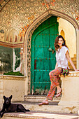 Woman with dog in Jaipur, Rajasthan, India, Asia