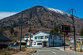 Traditional houses in Chuzenjiko Onsen below Mount Nantai, Nikko's sacred volcano, UNESCO World Heritage Site, Nikko, Tochigi Prefecture, Kanto, Honshu, Japan, Asia