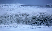 Surf at Reynisfjara black sand beach near Reynisdrangar sea stacks, near Vik, southern Iceland, Polar Regions