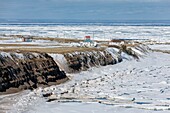 Canada, Province of New Brunswick, Chaleur Region, Chaleur Bay, Great Anse and Bathurst Coast, Beach and Pokeshaw Bay at the time of spring ice melt