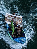 Egypt, Upper Egypt, Nile Valley, at Kom Ombo, a boat of traders who tie up with the cruise ships that sail on the Nile to sell cotton goods to tourists