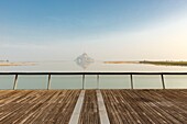 France, Manche, Mont Saint Michel bay listed as World Heritage by UNESCO, Mont Saint Michel at high tide from the dam and footbridge by architect Dietmar Feichtinger