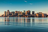 United States, New England, Massachusetts, Boston, city skyline from Boston Harbor, dawn