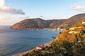 West Indies, British Virgin Islands, Tortola Island, in the Bay of Cane Garden sailboats at anchor, on the mountains some houses