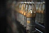 France, Nord, Lewarde, Historic Mining Center listed as World Heritage by UNESCO, visit the reconstituted mine, alignments of the lamps of the miners in the lamp shop