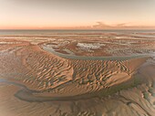 France, Somme, Baie de Somme, La Mollière d'Aval, flight over the Baie de Somme near Cayeux sur Mer, here the shoreline consists of the pebble cord that extends to the cliffs of Ault and at low tide the sandbanks extend to view