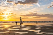 France, Somme, Ault, The large sandy beaches of the windswept coast of Picardy are an ideal place for the practice of the sail-hauler, at sunset