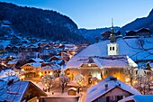 France, Haute Savoie, Massif du Chablais the doors of the sun Morzine the district of the church at dusk