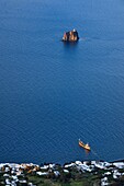 Italy, Sicily, Aeolian Islands, listed as World Heritage by UNESCO, Stromboli island, islet of Strombolicchio, rock of solidified magma from an old volcanic cap, now occupied by a lighthouse