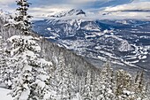 Canada, Alberta, Canadian Rocky Mountains listed as UNESCO World Heritage Site, Banff National Park, the town of Banff and the Bow river from Sulphur mountain in winter