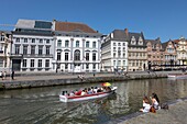 Belgium, East Flanders, Ghent, Korenlei (Quai au Blé), along the river Lys, tourist boats and old houses of baroque and classical style